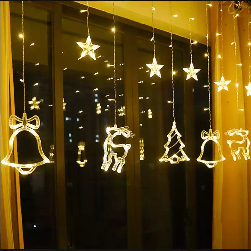 Instalatie de craciun perdea luminoasa cu figurine brazi, reni si clopotei