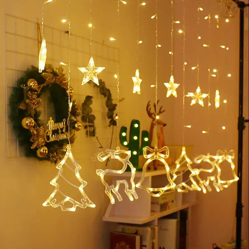 Instalatie de craciun perdea luminoasa cu figurine brazi, reni si clopotei