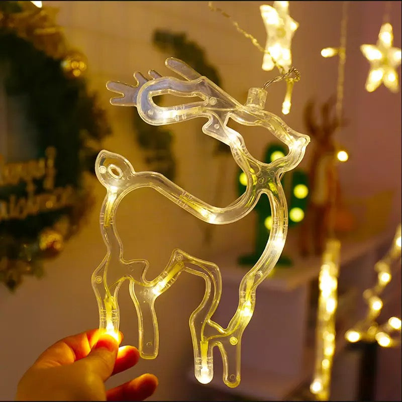 Instalatie de craciun perdea luminoasa cu figurine brazi, reni si clopotei