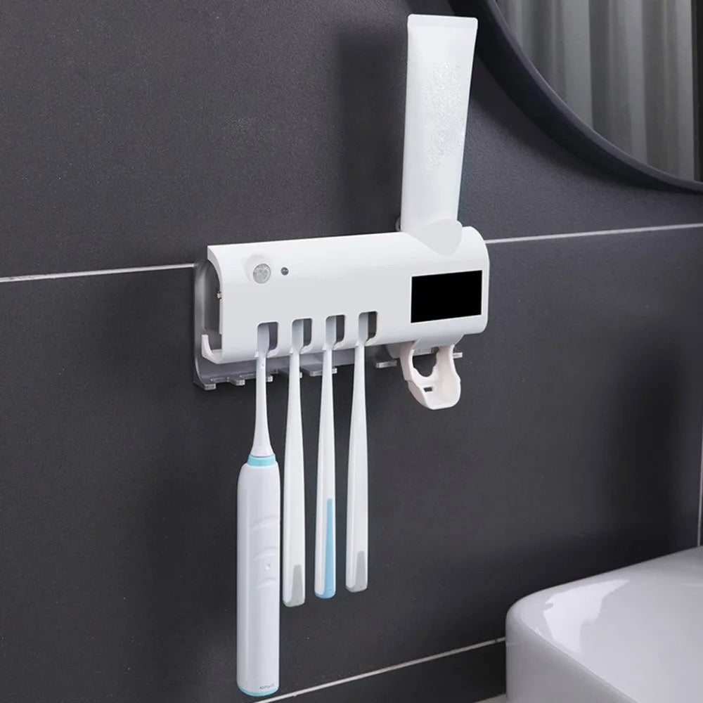 Dozator pentru pasta de dinti cu alimentare solara si sterilizator UV pentru periute